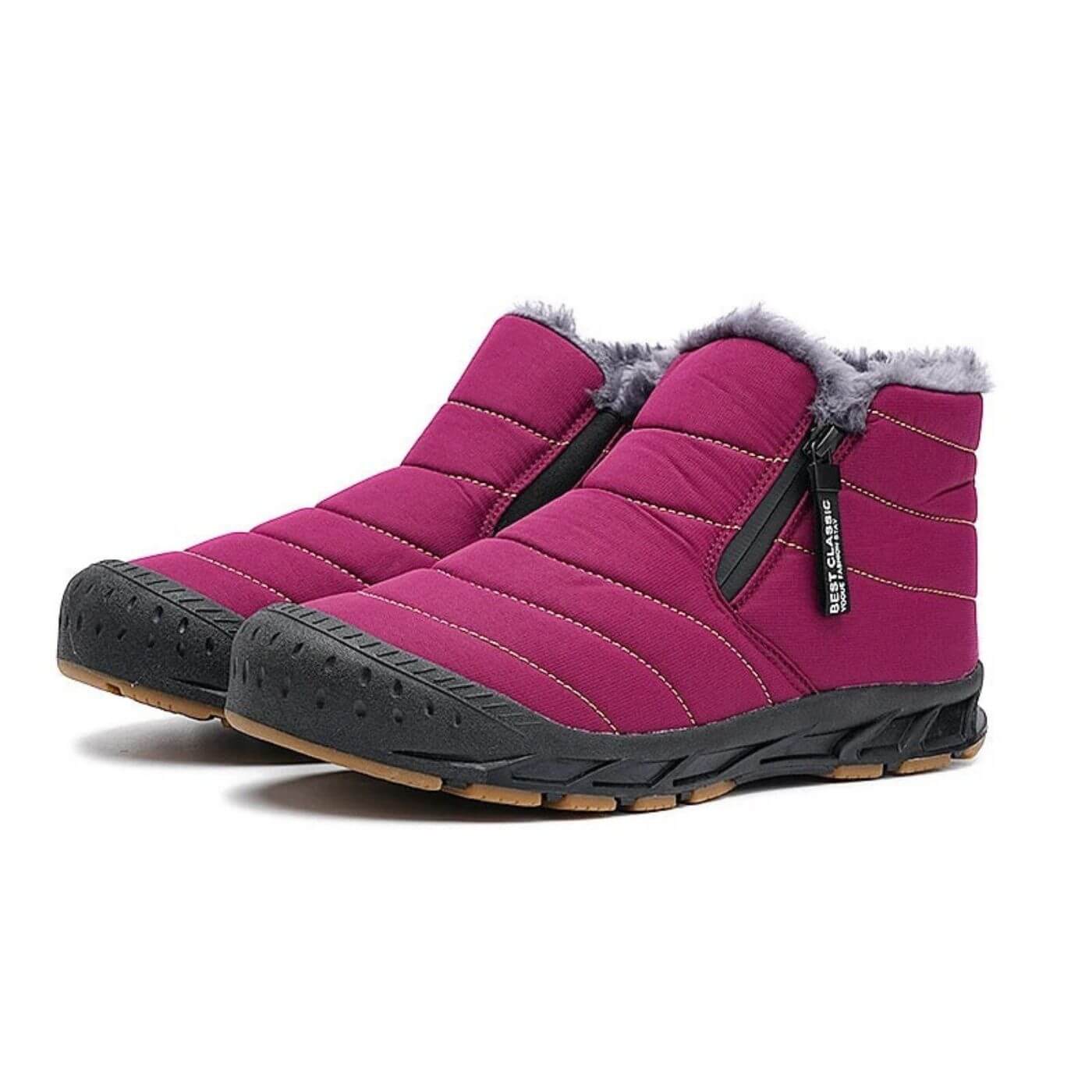 Bottes d'hiver roses imperméables pour femme avec doublure en fourrure. Chaudes, confortables et stylées pour l’hiver.