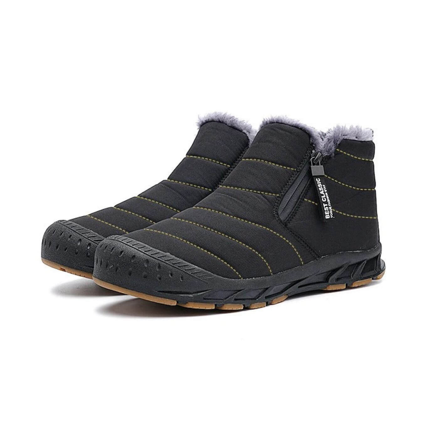 Bottes d'hiver noires classiques imperméables avec intérieur en fourrure. Idéales pour garder les pieds au chaud par temps froid.