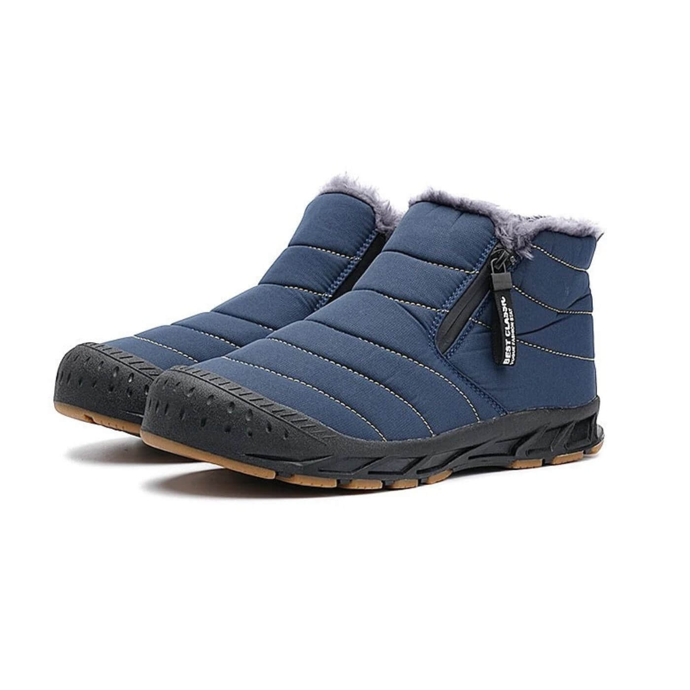 Bottes d'hiver bleu marine imperméables avec doublure en fourrure. Durables, chaudes et antidérapantes pour les surfaces glacées.